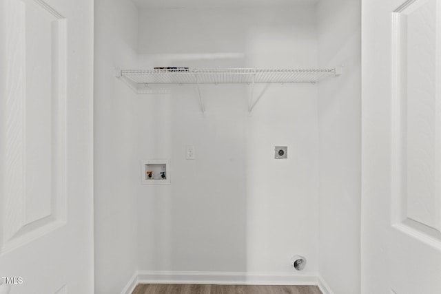 620 Hanska Way, Raleigh, NC 27610 - washroom with hookup for an electric dryer, hookup for a washing machine, wood finished floors, and baseboards