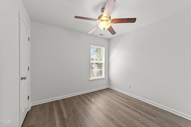 620 Hanska Way, Raleigh, NC 27610 - unfurnished room featuring wood finished floors, a ceiling fan, and baseboards