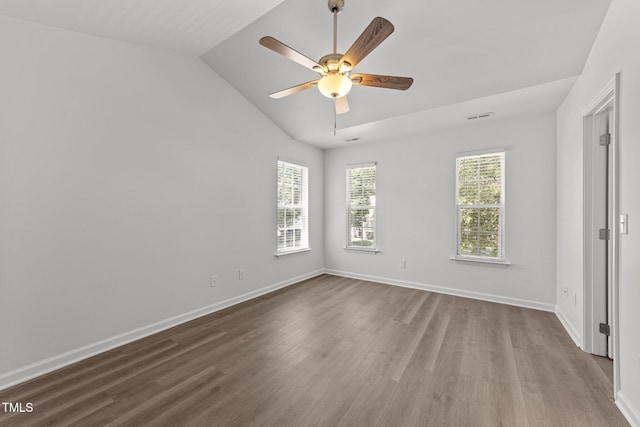 620 Hanska Way, Raleigh, NC 27610 - unfurnished room featuring wood finished floors, ceiling fan, lofted ceiling, and baseboards