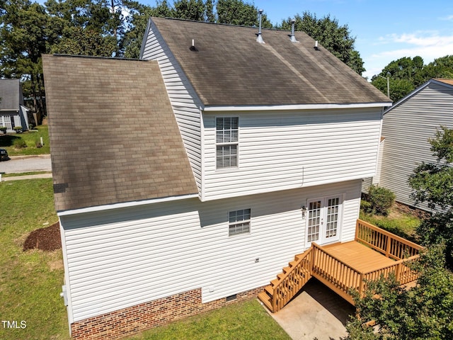 620 Hanska Way, Raleigh, NC 27610 - rear view of property with french doors, a wooden deck, a shingled roof, crawl space, and a lawn