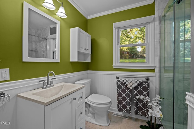 bathroom with crown molding, visible vents, vanity, and a wainscoted wall