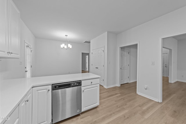 633 Prickly Pear Dr, Fuquay Varina, NC 27526 - kitchen featuring stainless steel dishwasher, a peninsula, white cabinets, and a chandelier