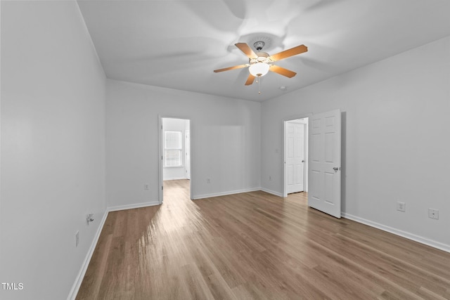 633 Prickly Pear Dr, Fuquay Varina, NC 27526 - unfurnished room featuring a ceiling fan, wood finished floors, and baseboards
