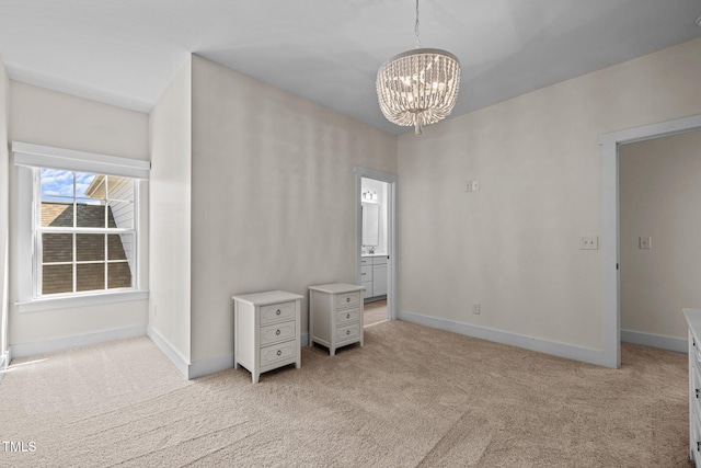 unfurnished bedroom with baseboards, a chandelier, and light carpet