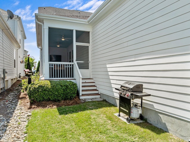 doorway to property with a yard