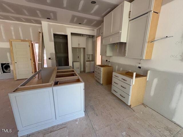 348 Inspiration Way, Fuquay Varina, NC 27526 - kitchen featuring white cabinetry and a center island