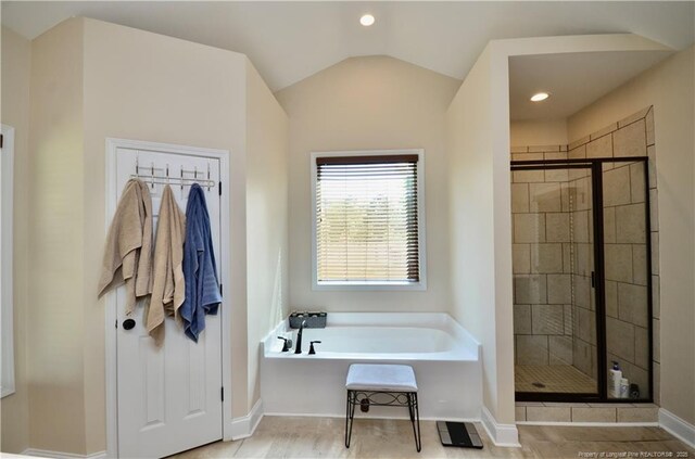 6226 Deerstand Rd, Wade, NC 28395 - full bath with a garden tub, a stall shower, vaulted ceiling, baseboards, and recessed lighting
