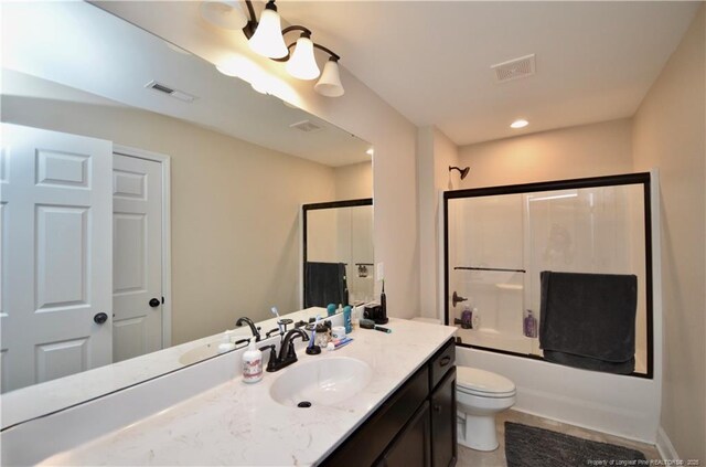 6226 Deerstand Rd, Wade, NC 28395 - full bath with vanity, toilet, bath / shower combo with glass door, and tile patterned floors