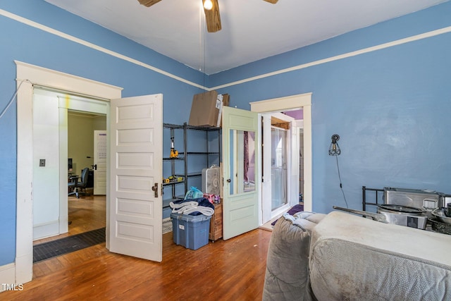 303 Wilcox St, Warrenton, NC 27589 - bedroom with wood finished floors and ceiling fan