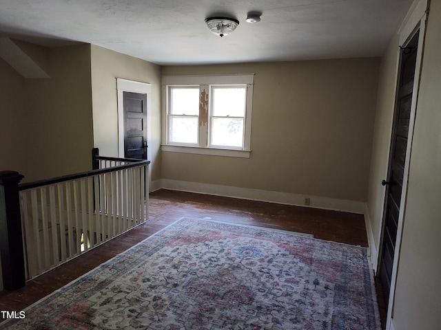 303 Wilcox St, Warrenton, NC 27589 - unfurnished room featuring wood finished floors and baseboards