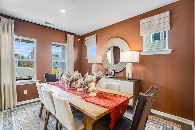 1248 Hardin Hill Ln, Knightdale, NC 27545 - dining space with baseboards, wood finished floors, visible vents, and recessed lighting