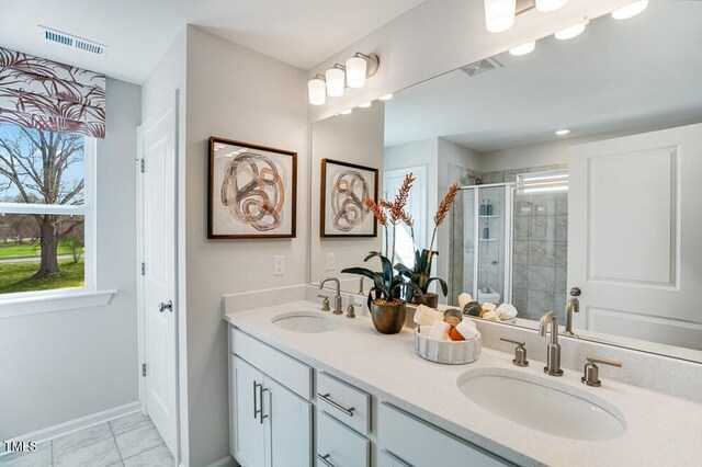 1248 Hardin Hill Ln, Knightdale, NC 27545 - full bathroom with a shower stall, visible vents, baseboards, and a sink