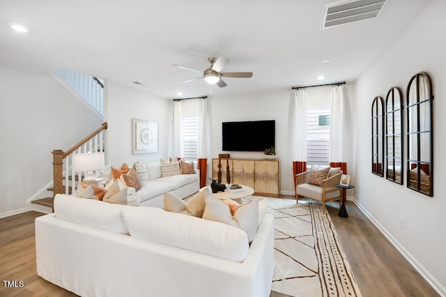 1248 Hardin Hill Ln, Knightdale, NC 27545 - living room with light wood-style flooring, visible vents, recessed lighting, a ceiling fan, and stairs