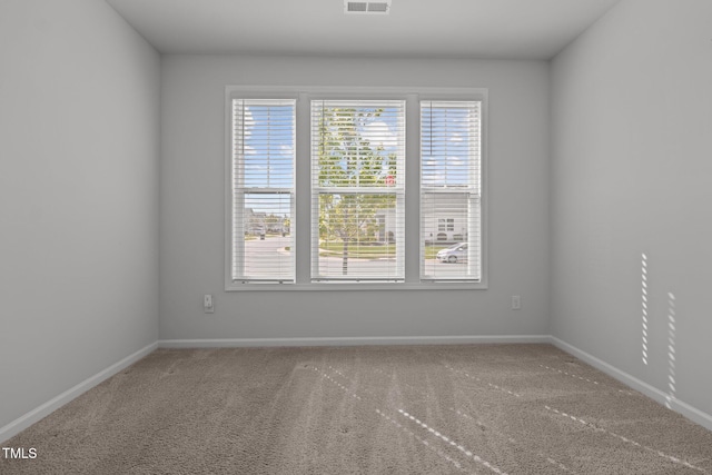 1047 Aberlour Ln, Burlington, NC 27215 - carpeted spare room with baseboards and visible vents