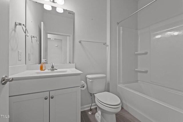 1047 Aberlour Ln, Burlington, NC 27215 - bathroom featuring tile patterned floors, vanity,  shower combination, baseboards, and toilet