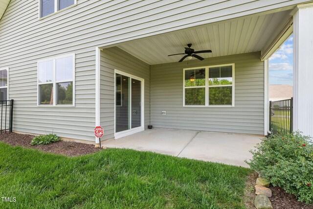 1047 Aberlour Ln, Burlington, NC 27215 - view of patio / terrace with a ceiling fan and fence