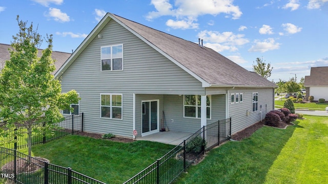 1047 Aberlour Ln, Burlington, NC 27215 - rear view of property with a lawn, roof with shingles, a patio area, and a fenced backyard