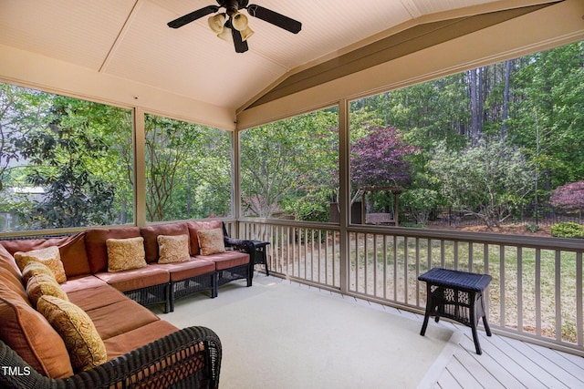 sunroom / solarium with ceiling fan and an outdoor hangout area