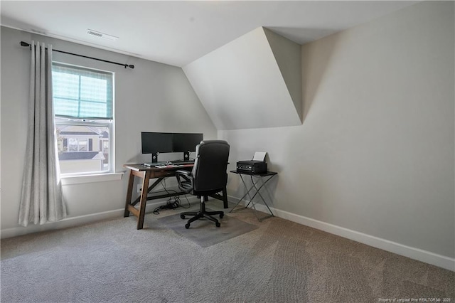 office area with baseboards, visible vents, and carpet floors