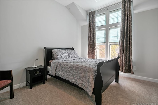 carpeted bedroom with baseboards