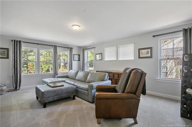 living room with carpet floors and baseboards