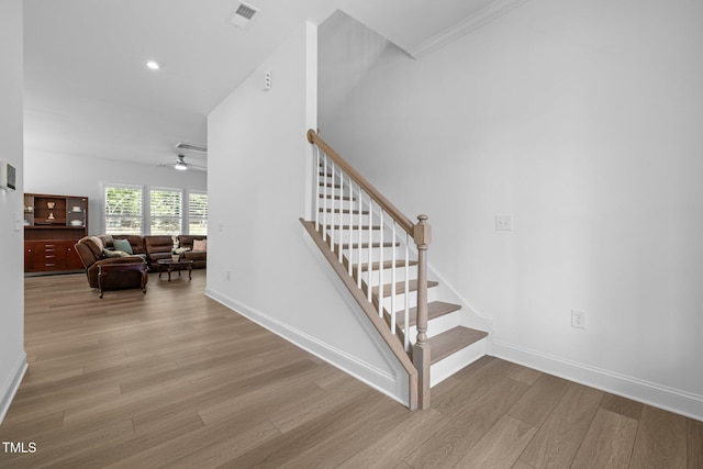 386 The Parks Dr, Pittsboro, NC 27312 - stairs with wood finished floors, ceiling fan, baseboards, recessed lighting, and ornamental molding