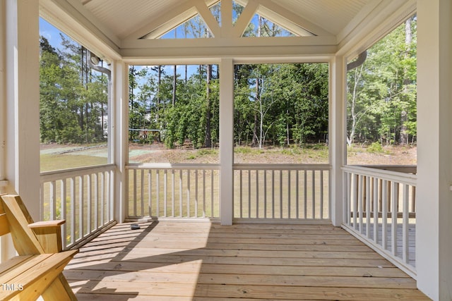 386 The Parks Dr, Pittsboro, NC 27312 - unfurnished sunroom with vaulted ceiling and view of wooded area