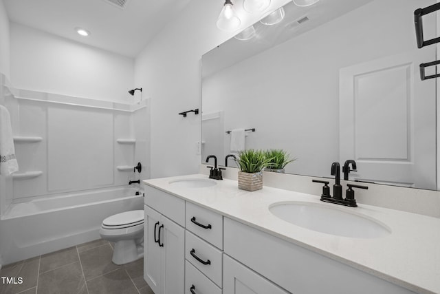 386 The Parks Dr, Pittsboro, NC 27312 - full bath featuring tile patterned flooring, toilet, double vanity,  shower combination, and recessed lighting