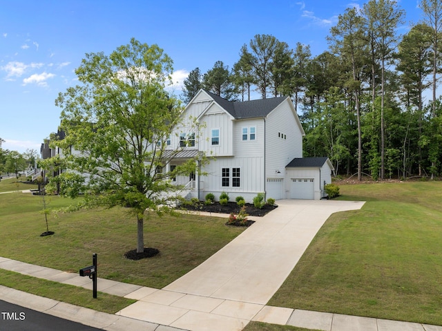 386 The Parks Dr, Pittsboro, NC 27312 - modern inspired farmhouse with board and batten siding, concrete driveway, and a front yard