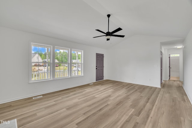 112 Edmondson Dr, Willow Springs, NC 27592 - unfurnished living room featuring lofted ceiling, light wood-style flooring, visible vents, ceiling fan, and baseboards