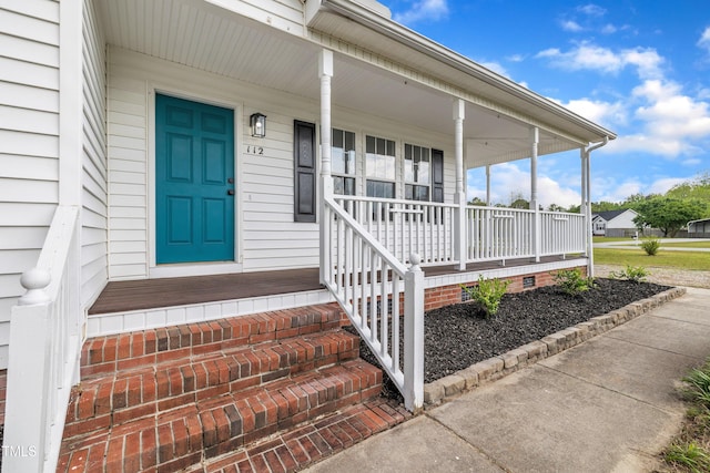112 Edmondson Dr, Willow Springs, NC 27592 - entrance to property featuring a porch