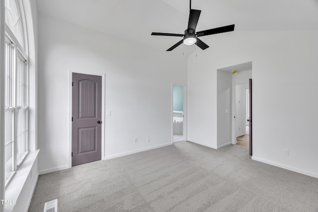 112 Edmondson Dr, Willow Springs, NC 27592 - carpeted empty room featuring lofted ceiling, visible vents, a ceiling fan, and baseboards