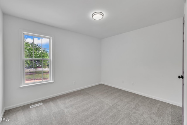 112 Edmondson Dr, Willow Springs, NC 27592 - empty room with carpet flooring, visible vents, and baseboards