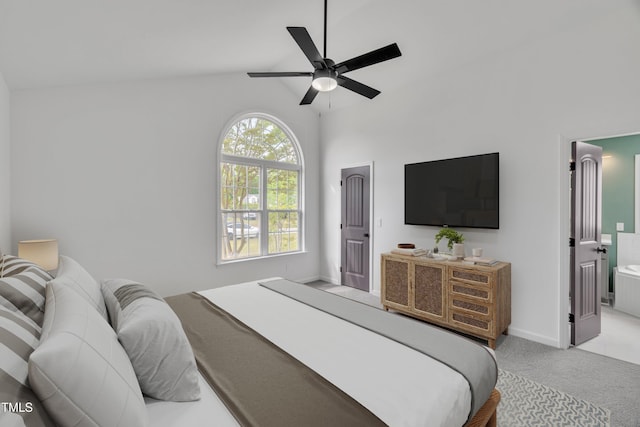 112 Edmondson Dr, Willow Springs, NC 27592 - carpeted bedroom featuring baseboards, ceiling fan, connected bathroom, and lofted ceiling