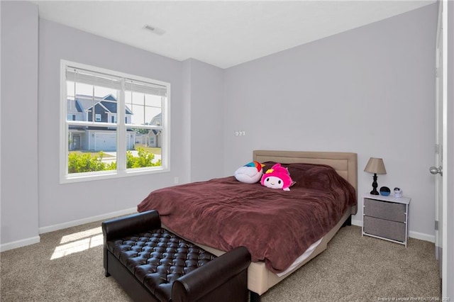 504 Loom Dr, Fayetteville, NC 28306 - bedroom with carpet flooring and baseboards