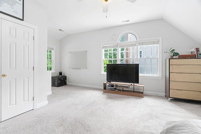 108 Nimbus Ct, Cary, NC 27513 - living room with lofted ceiling, ceiling fan, carpet floors, healthy amount of natural light, and baseboards