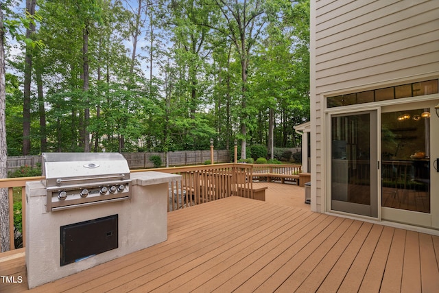 108 Nimbus Ct, Cary, NC 27513 - wooden terrace with area for grilling, a fenced backyard, and view of wooded area