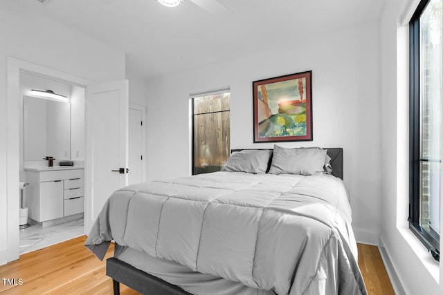 211 W Coporation, Durham, NC 27701 - bedroom with multiple windows and ensuite bathroom