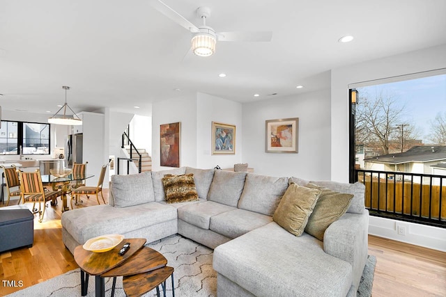 211 W Coporation, Durham, NC 27701 - living room with light wood-style floors, a ceiling fan, stairs, and recessed lighting