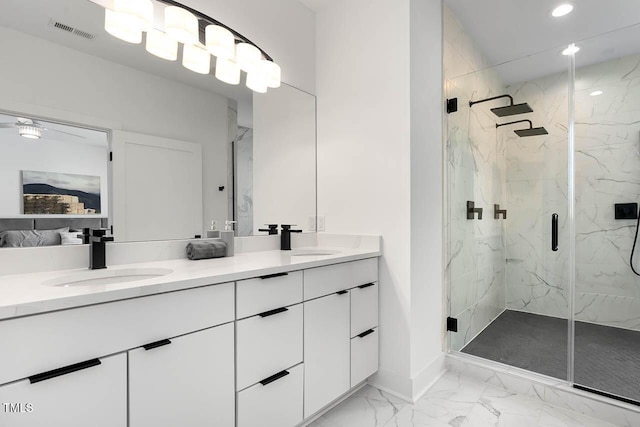 211 W Coporation, Durham, NC 27701 - full bathroom featuring marble look tile flooring, recessed lighting, double vanity, a marble finish shower, and baseboards