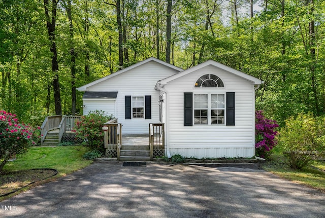 107 Piquot Dr, Louisburg, NC 27549 - view of front of home featuring a wooden deck