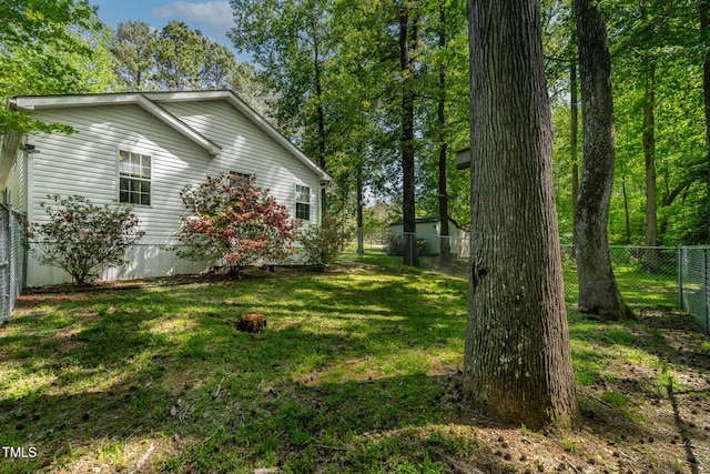 107 Piquot Dr, Louisburg, NC 27549 - view of yard with a fenced backyard