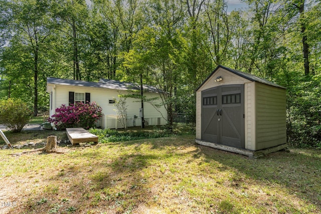 107 Piquot Dr, Louisburg, NC 27549 - view of yard with an outdoor structure and a shed