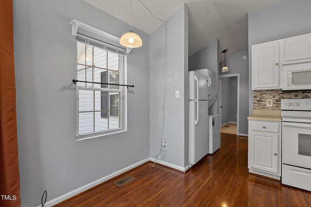 107 Piquot Dr, Louisburg, NC 27549 - kitchen with visible vents, white appliances, white cabinets, and dark wood-style floors