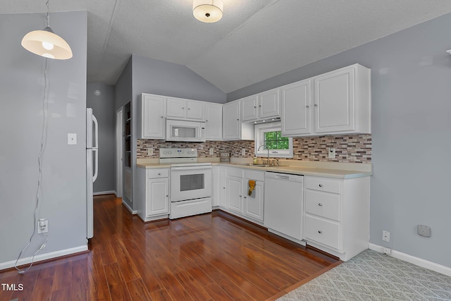 107 Piquot Dr, Louisburg, NC 27549 - kitchen featuring a sink, white appliances, light countertops, backsplash, and lofted ceiling