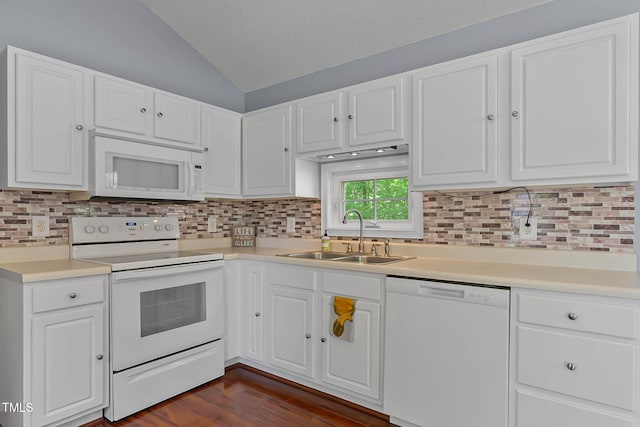 107 Piquot Dr, Louisburg, NC 27549 - kitchen featuring white cabinets, vaulted ceiling, white appliances, and a sink