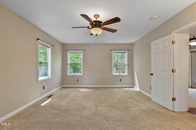 107 Piquot Dr, Louisburg, NC 27549 - unfurnished room featuring visible vents, baseboards, ceiling fan, and light colored carpet