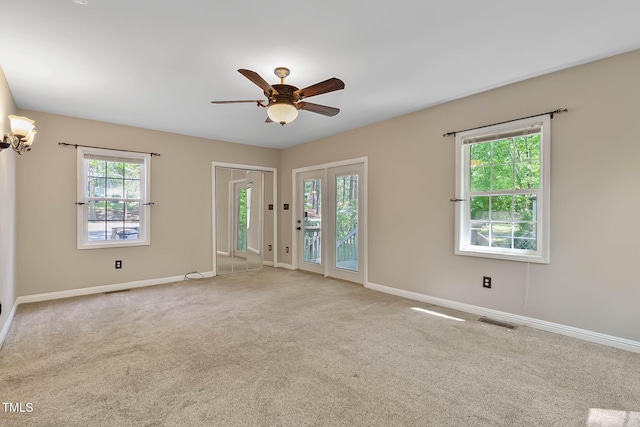 107 Piquot Dr, Louisburg, NC 27549 - spare room featuring ceiling fan, baseboards, visible vents, and plenty of natural light
