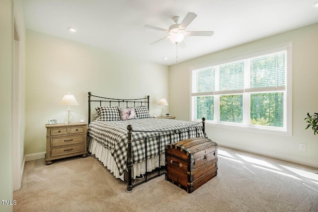 83 Vandalia Ave, Chapel Hill, NC 27516 - bedroom with light carpet, baseboards, and ceiling fan