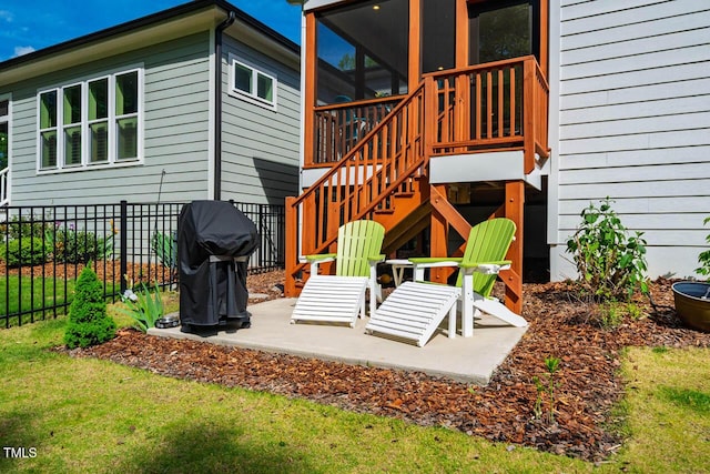 83 Vandalia Ave, Chapel Hill, NC 27516 - exterior space featuring a sunroom, fence, and a grill